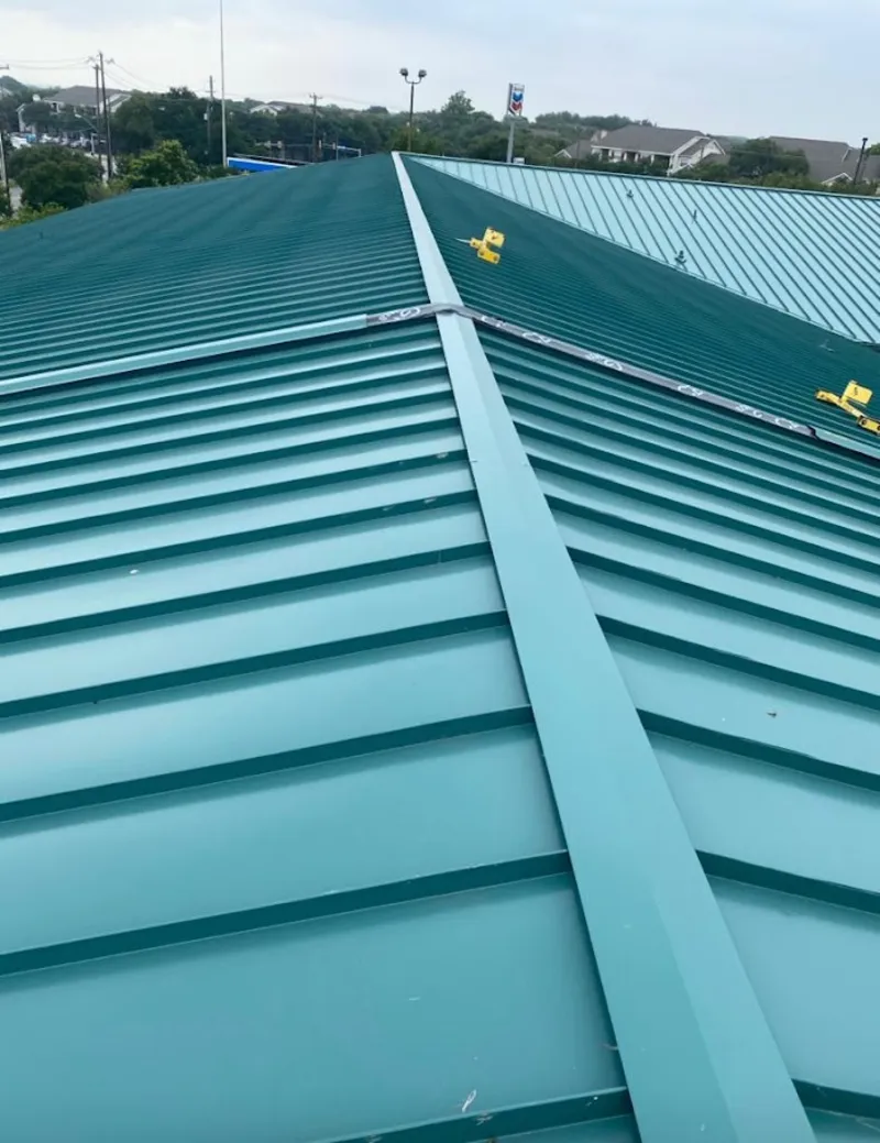Green commercial metal roof ridge and valley for Metal Roof Repair in Huntertown